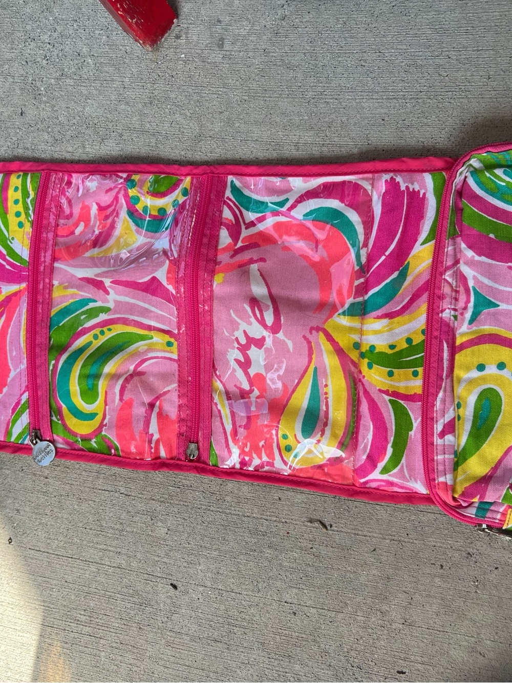 WomanMulti-Compartment Travel Organizer with Colorful Swirl Print
